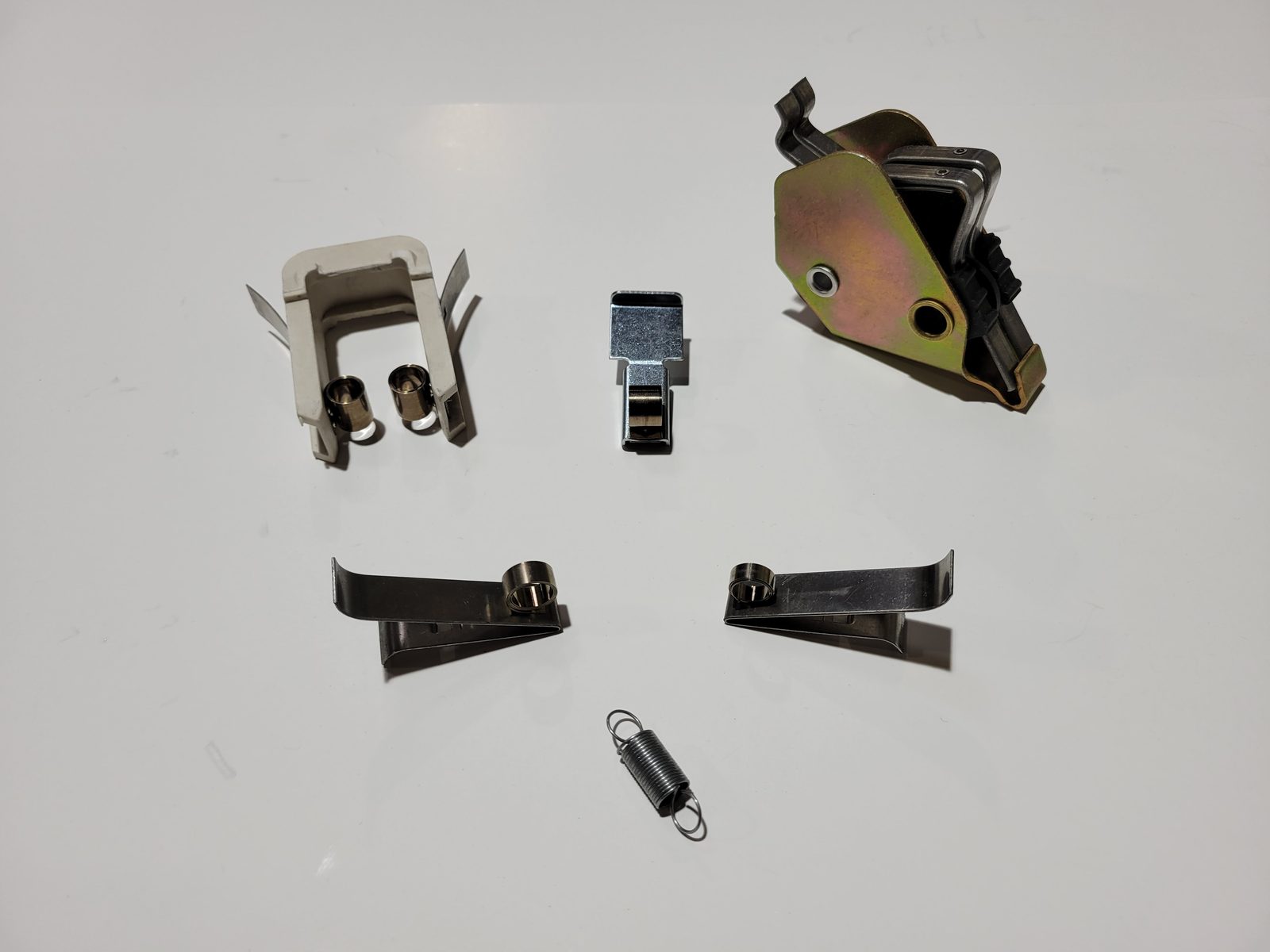 Locomotive brush holder spring clips